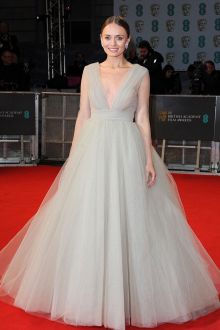 laura haddock grey tulle sheer long sleeve ball gown bafta 2015 red carpet